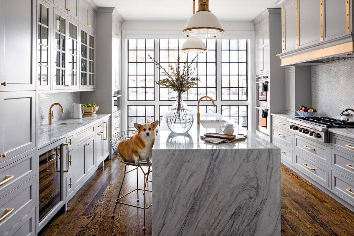 Gray cabinets with brass accent