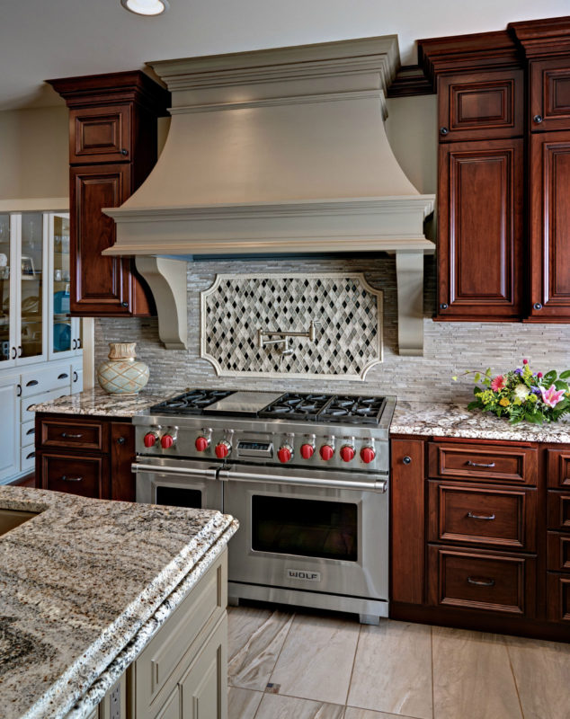 Traditional Cherry Cabinets with Medium Brown Painted Island