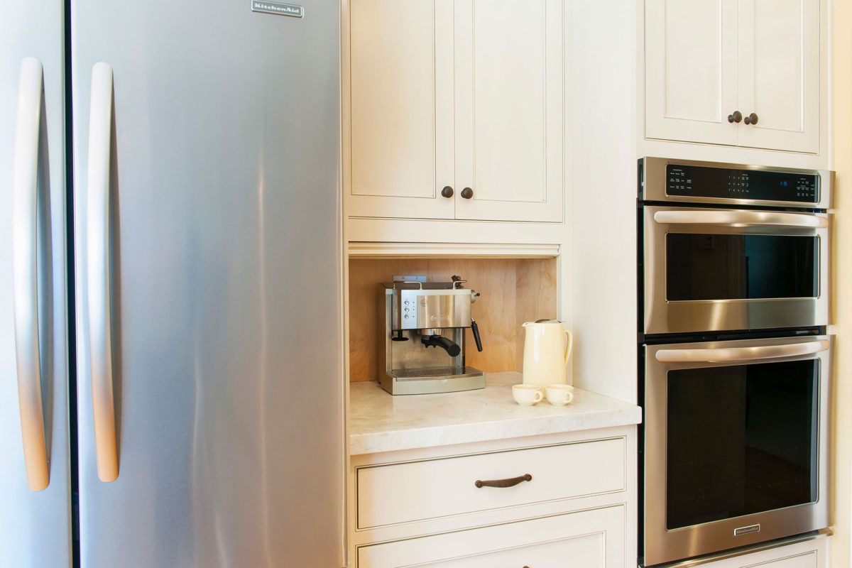 Transitonal Painted White Kitchen with Grey Stained Peninsila