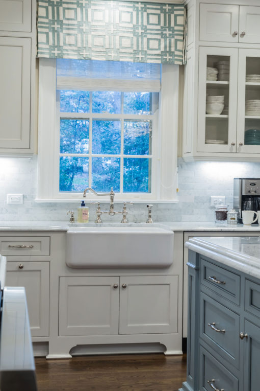 White Kitchen with Light Blue Painted Island - Crystal Cabinets