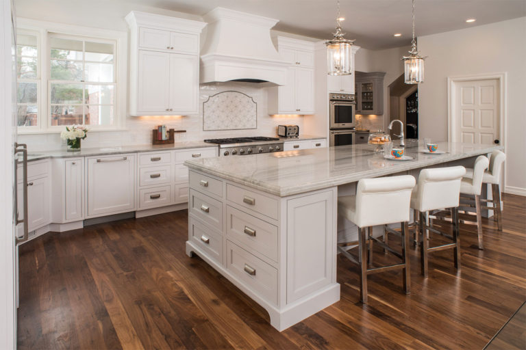 white kitchen with light grey island